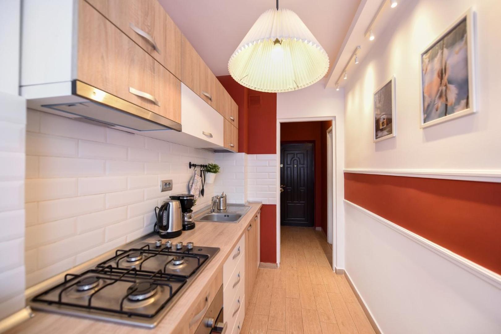 Downtown Oasis: Central Apartments With Cozy Charm Bukarest Værelse billede